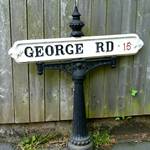 Altes gueisernes Strassenschild