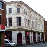 Aelteres Backsteinhaus, weiss angestrichen